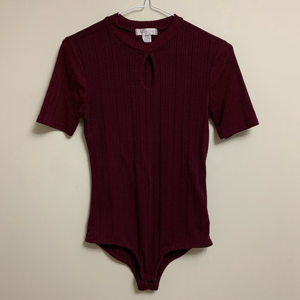 Burgundy ribbed bodysuit, keyhole , snap closer.